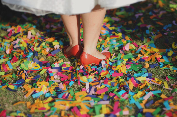 wedding confetti and red wedding shoes