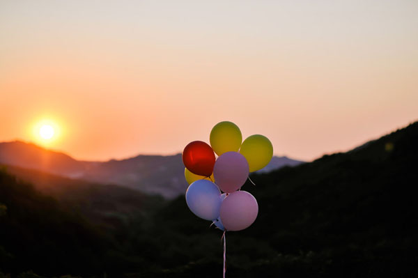 wedding balloons at sunset